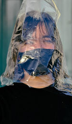 Portrait of woman in fish tank