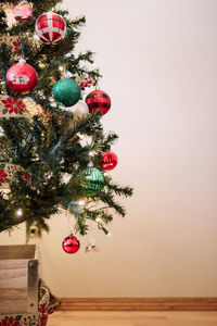 Christmas tree against wall