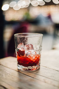 Close-up of beer glass on table