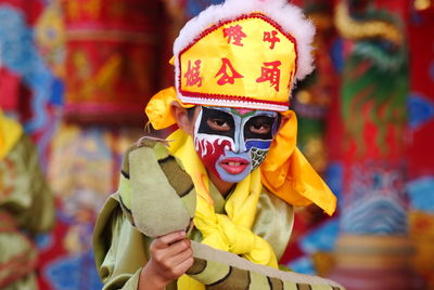 Close-up of boy wearing carnival costume