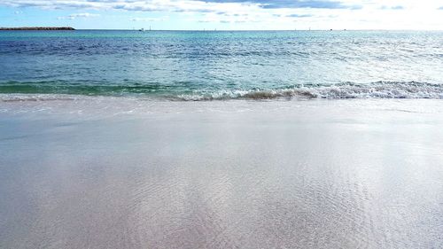 View of calm blue sea against the sky