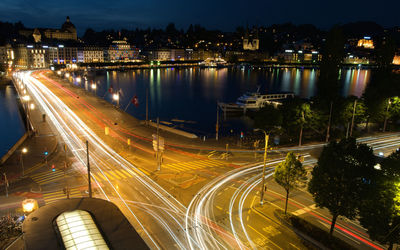 High angle view of light trails on city street at night