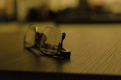 Close-up of sunglasses on table