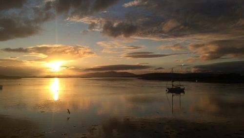 Scenic view of sunset over calm sea