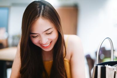 Smiling woman at cafe