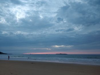 Scenic view of beach against sky