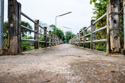 View of empty road along plants