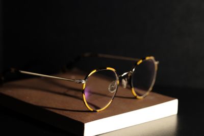 Close-up of eyeglasses on table