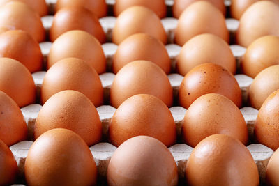 Full frame shot of eggs in carton