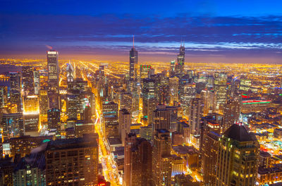 Aerial view of city at night