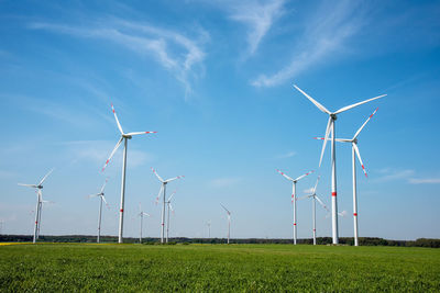 Modern wind energy generators on a sunny day seen in germany