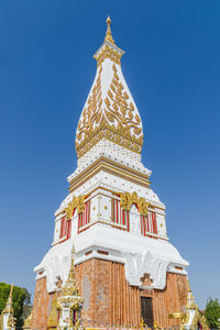 Low angle view of building against blue sky