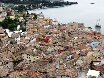 High angle view of townscape by sea