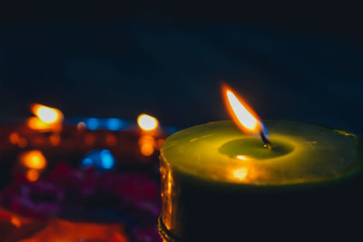 Close-up of burning candles