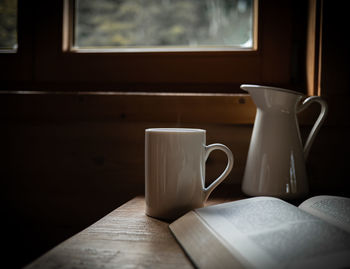 Close-up of coffee cup on table