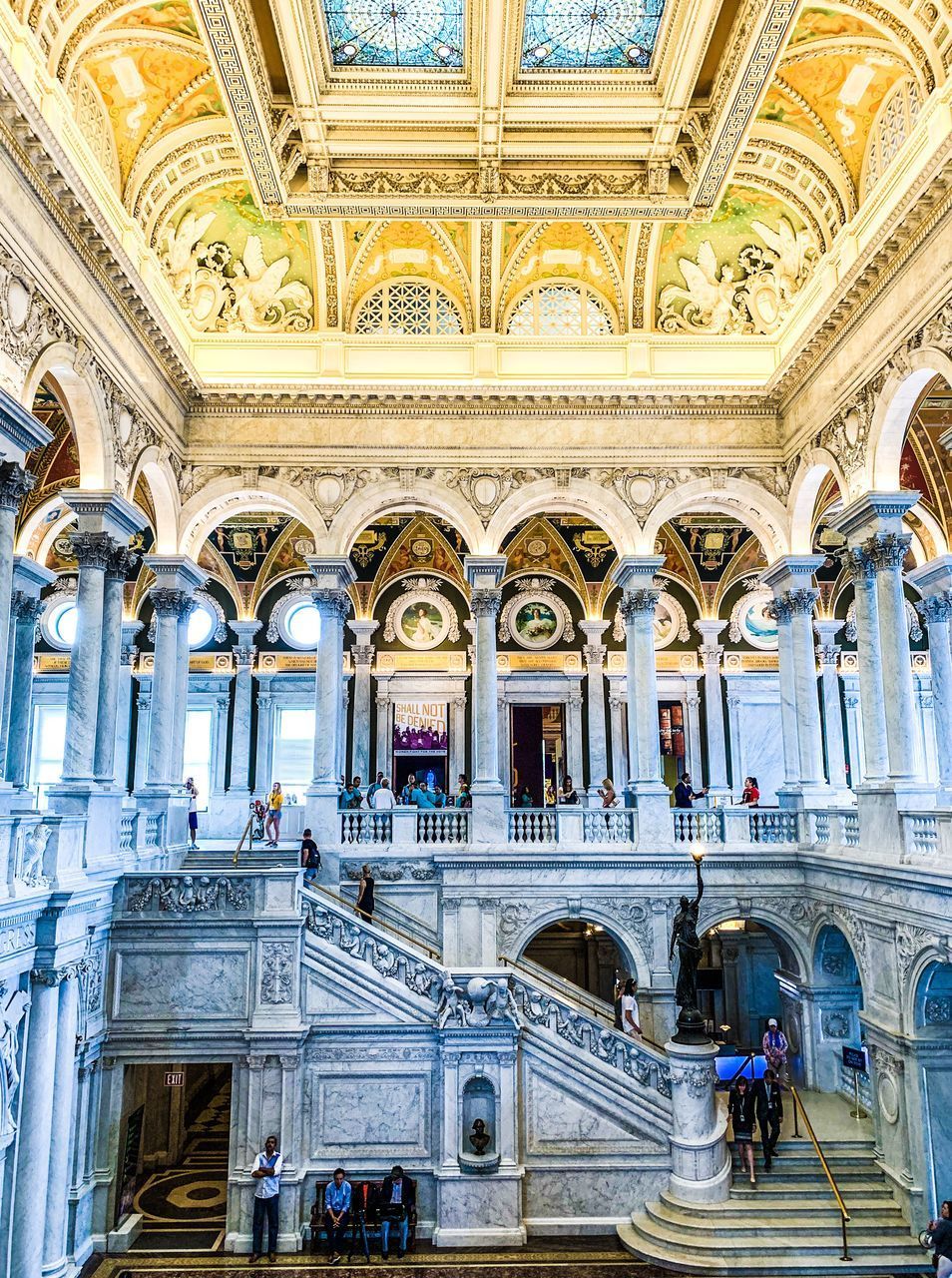 GROUP OF PEOPLE IN A BUILDING