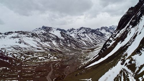 Snow covered mountain against sky