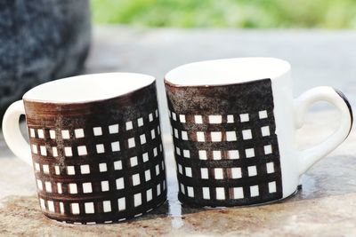 Close-up of coffee cup on table