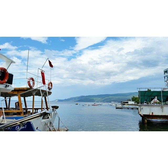 water, nautical vessel, sea, sky, boat, transportation, transfer print, moored, mode of transport, horizon over water, auto post production filter, cloud - sky, nature, tranquil scene, scenics, tranquility, beauty in nature, cloud, pier, day