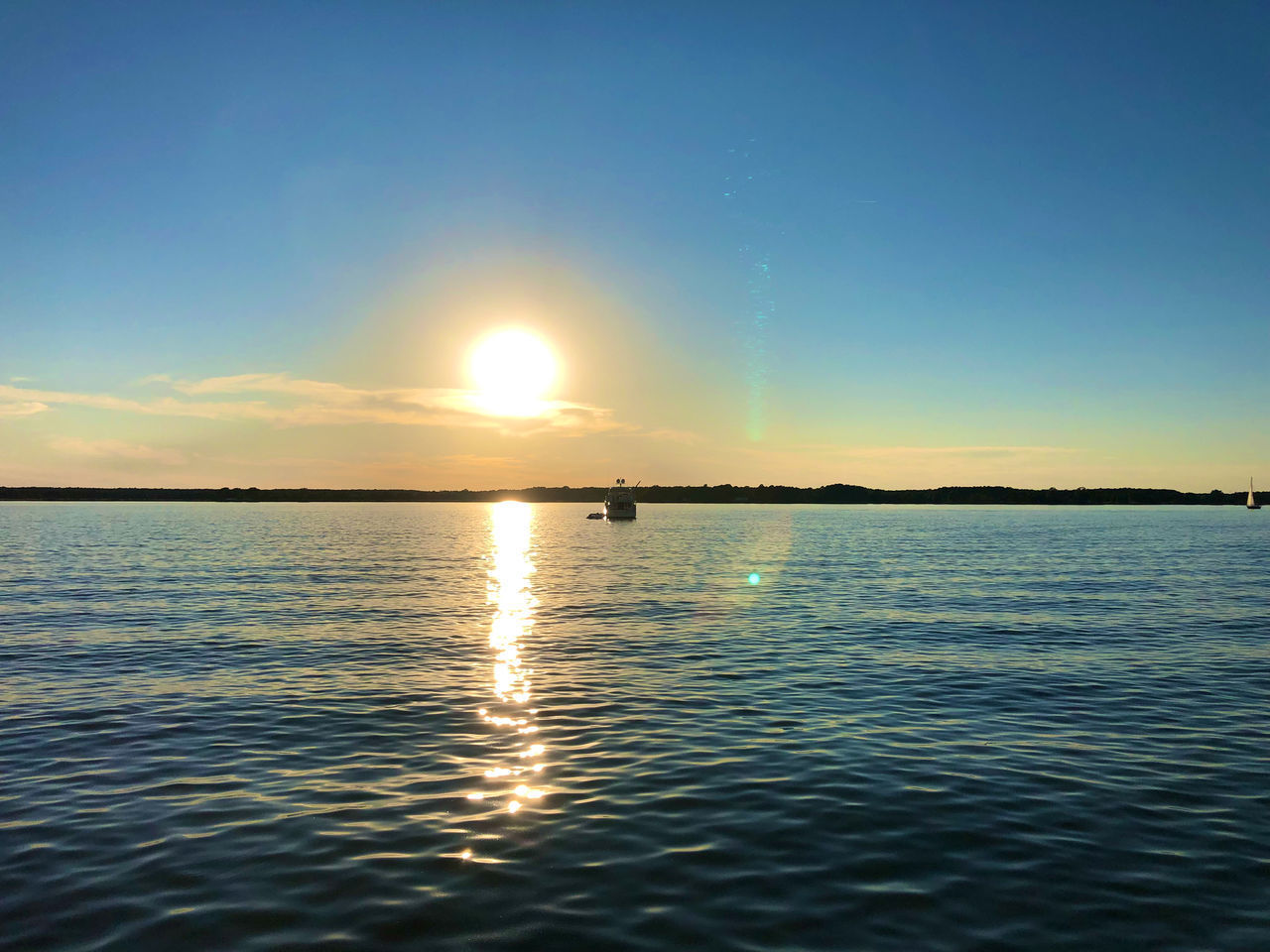 SCENIC VIEW OF SEA DURING SUNSET