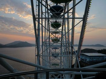 Built structure against sky at sunset
