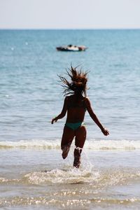 Woman in bikini at beach