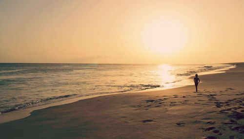 Scenic view of sea at sunset