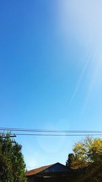 Low angle view of built structure against blue sky