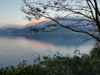 Scenic view of lake against sky during sunset
