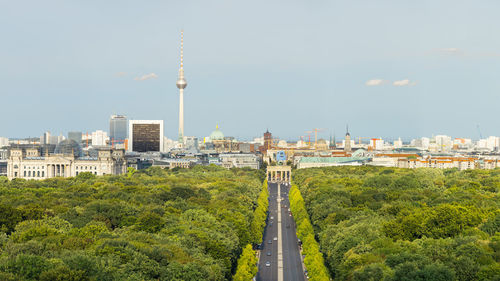 View of buildings in city against sky