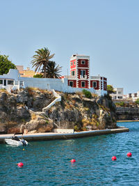 Architecture of houses on the coast of the port of mahon mao in menorca, spain