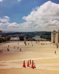 High angle view of people walking on facade