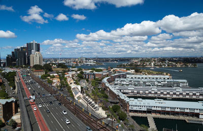 High angle view of city against cloudy sky