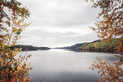 Scenic view of lake against sky during autumn