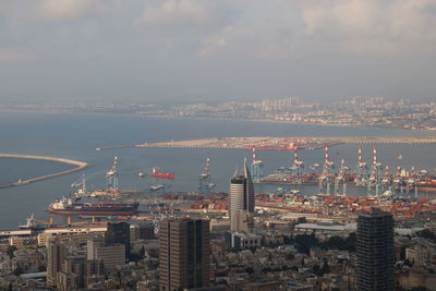 High angle view of buildings in city against sky