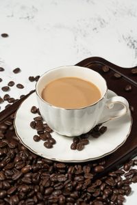 High angle view of coffee cup on table