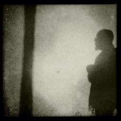 Shadow of woman on wall