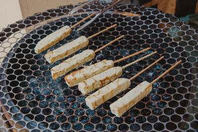Close-up of meat on barbecue grill