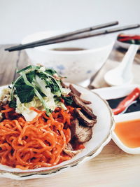 Close-up of food served on table