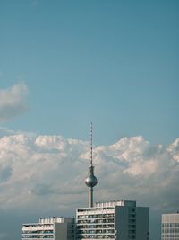 Buildings in city against sky