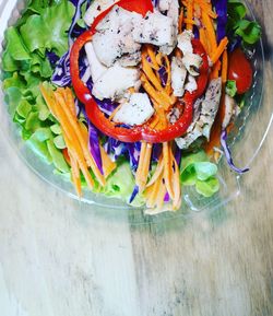 High angle view of chopped vegetables in bowl on table