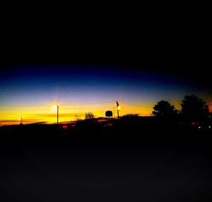 Silhouette of trees at sunset