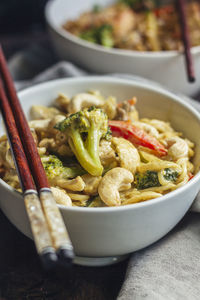 Yellow curry noodles with vegetables and cashews