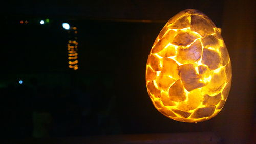 Close-up of illuminated light bulb