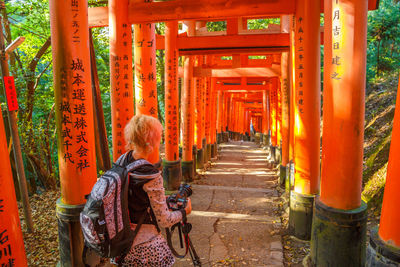 Rear view of woman at temple