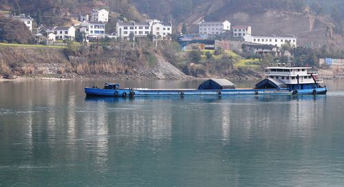 Scenic view of river against mountains