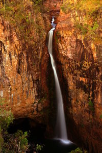 Scenic view of waterfall in forest