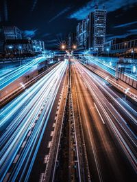 High angle view of light trails on city street