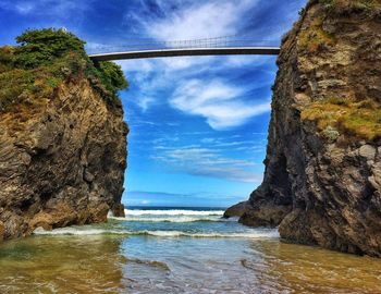 Scenic view of sea against cloudy sky
