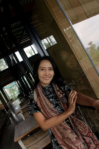 Portrait of a smiling young woman